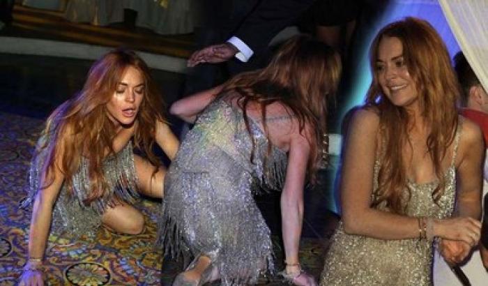 Lindsay Lohan caduta e lite a Ischia per sfuggire ai paparazzi
